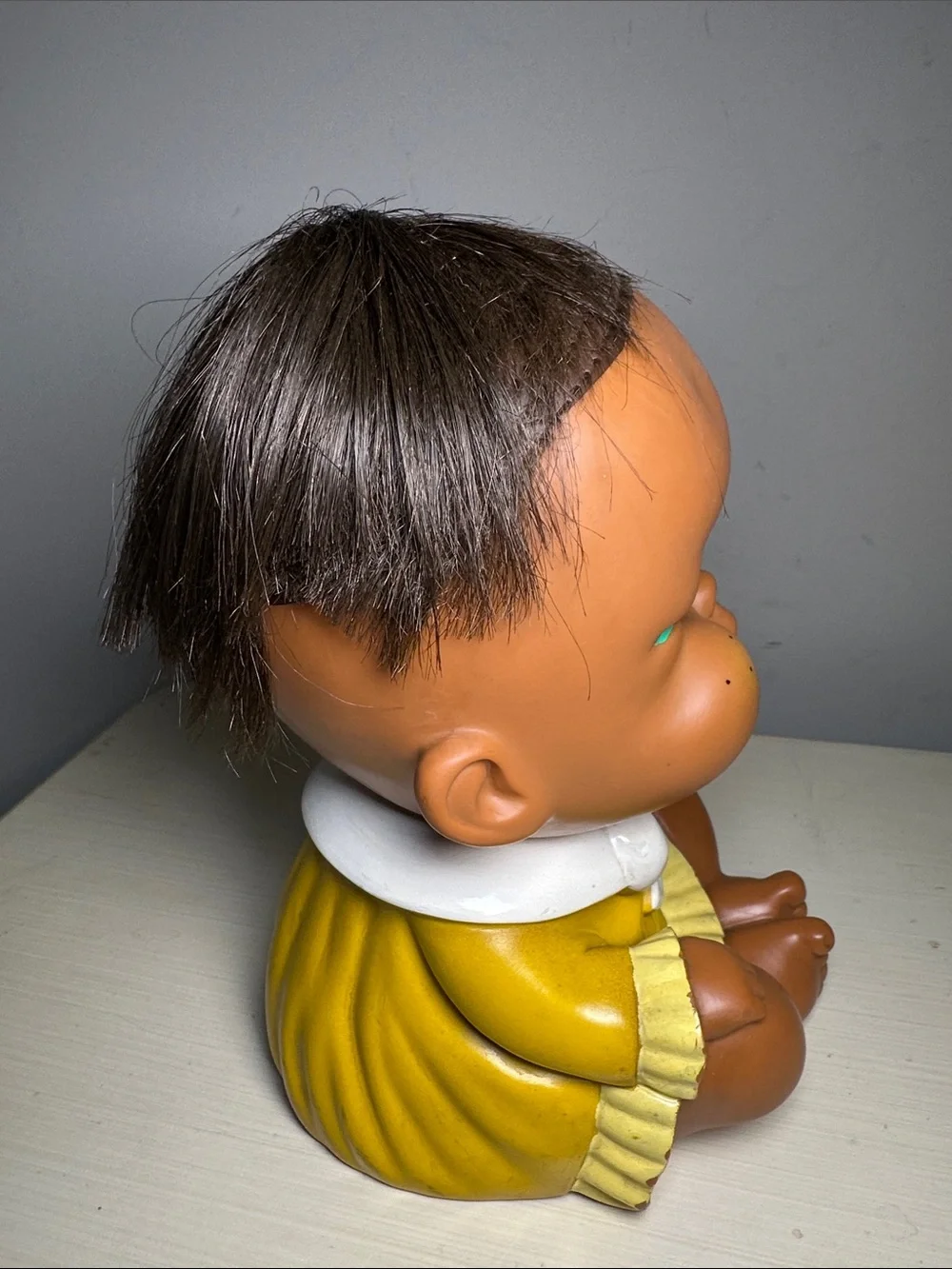 Vintage Moody Cutie grumpy Yellow Baby Doll Figure with Brown Hair Made in Japan
